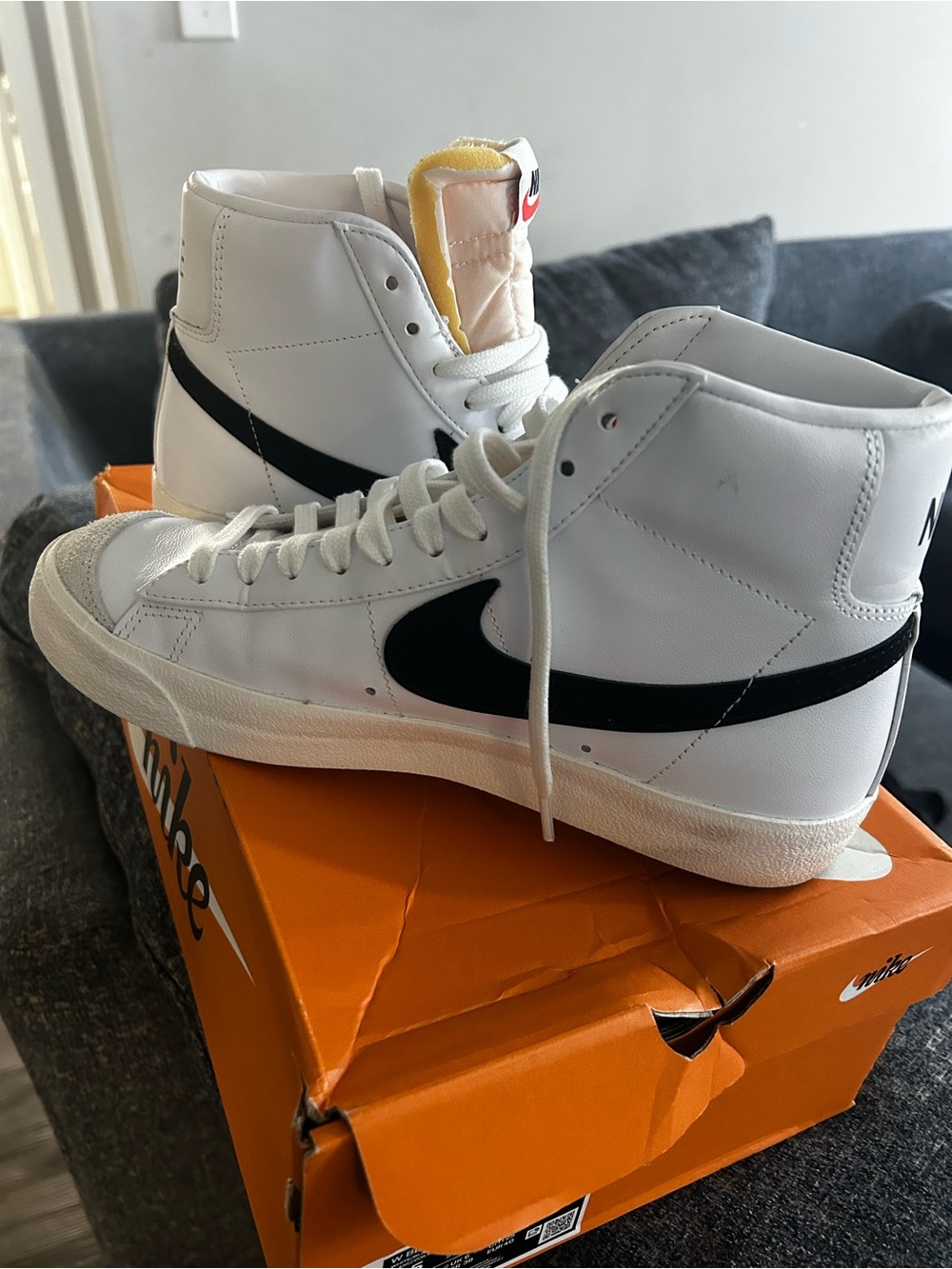 Nike White/Black High-Top Sneakers with Classic Swoosh